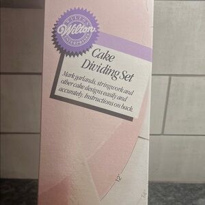 Wilton Cake Dividing Set ( new in box) in Pink with two extra tools.